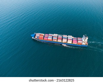 Aerial top view of cargo container ship in the sea
