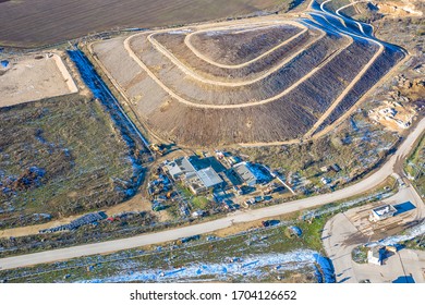 Aerial top view of a city garbage dump. Waste Disposal Facility - Powered by Shutterstock