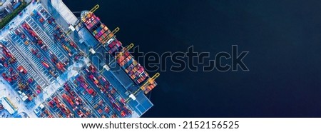 Aerial top view of Container ship loading and unloading, Cargo container in deep seaport for the international order concept. 