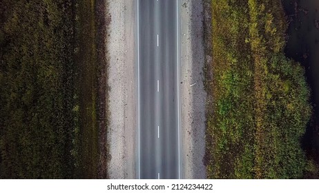 Aerial Top View Of Country Forest One-way Road. Highway Top Down View.