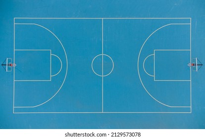 Aerial top view of the deserted basketball blue court - Powered by Shutterstock