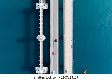 Aerial top view drone shot of bridge with cars on bridge road image transportation background concept. - Shutterstock ID 1207625119