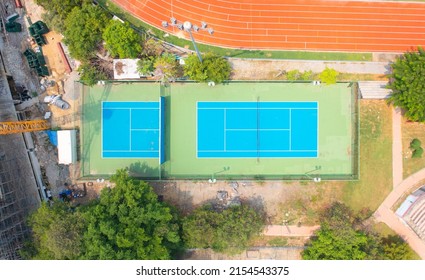 Aerial Top View Of Empty Tennis Court With Net, Sport And Recreation Activity Field Ground In Outdoor National Stadium. Green Arena. People Lifestyle.