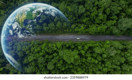 Aerial top view globe planet with electric vehicle car on asphalt road forest in tropical rainforest green forest tree, Green ev car on road tropical jungle forest, Electric car with nature. - Shutterstock ID 2359888979