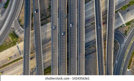 Aerial Top View Of Highway, Transport City Junction Road With Car On Intersection Cross Road, View From Above Shot By Drone