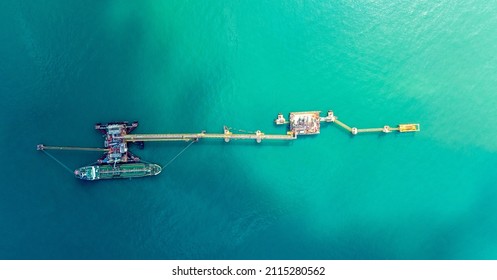 Aerial Top View Of  LPG Gas Tanker Ship At Crude Oil Terminal  For Load Or Unload Concept Business Logistic And Transportation