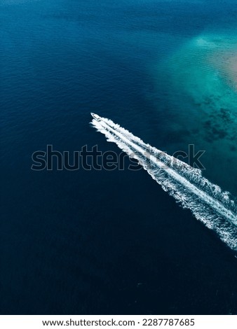 aerial top view luxury yacht sailing in sea .