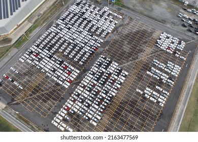 Aerial Top View Of New Cars Parking For Sale Stock Lot Row, Dealer Inventory Import And Export Business Commercial Worldwide, Automobile And Automotive Industry Distribution Logistic Global Transport