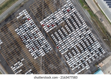 Aerial Top View Of New Cars Parking For Sale Stock Lot Row, Dealer Inventory Import And Export Business Commercial Worldwide, Automobile And Automotive Industry Distribution Logistic Global Transport