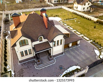 Aerial Top View Of New Residential House Cottage With Shingle Roof On Fenced Big Yard On Sunny Day.