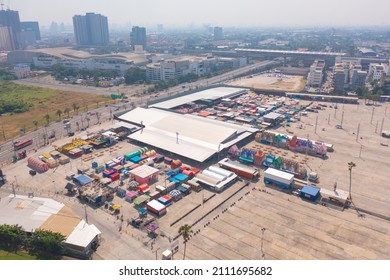 Aerial top view of Night Market people walking street, Colorful tents in the train of Ratchada at Bangkok city, Thailand. Retail shops - Powered by Shutterstock