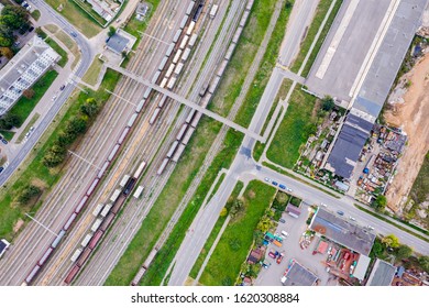 aerial top view on city industrial area with railroad cargo tracks. industrial background