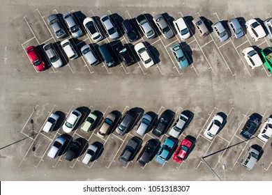 Aerial Top View Of The Open Space Carpark With Lots Of Car