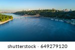 Aerial top view of pedestrian Park bridge and Dnieper river from above, city of Kiev, Ukraine
