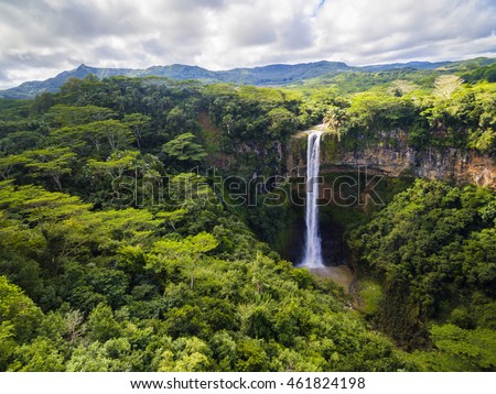 Aerial top view perspective of Chamarel Waterfall in the tropical island jungle of Mauritius