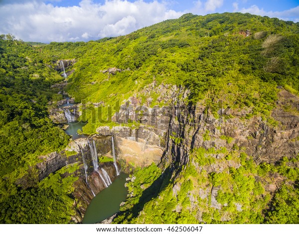 Aerial top view perspective of Tamarin Waterfall Seven Cascades in the tropical island jungle of Mauritius