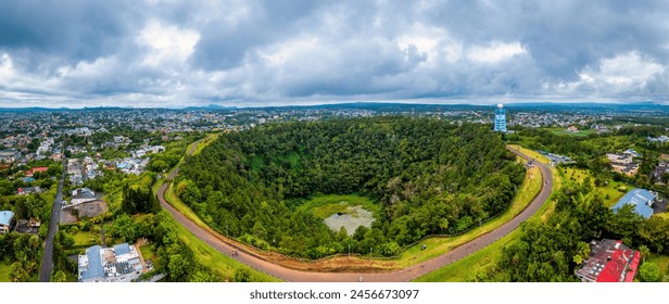 Aerial top view perspective of Trou Aux Cerf Volcano Curepipe in the tropical island jungle of Mauritius. Aerial view of Trou aux cerfs dormant volcano located at Curepipre, Mauritius - Powered by Shutterstock