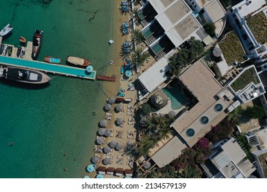 Aerial Top View Photo Of Beach Club In Mykonos Greece With Turquoise Waters