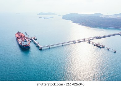 Aerial Top View Pipeline Transport. Natural Gas Pipeline For Oil Delivery Ships. Oil Tanker Ship To Port Of Europe - Import Export, Oil Tanker Ship Of Business Logistic Sea Going Ship