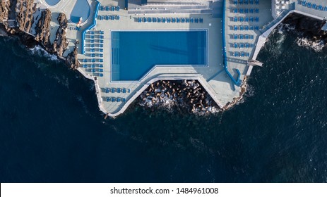 Aerial Top View Of Public Swimming Pools At Lido On Madeira Island, Portugal.