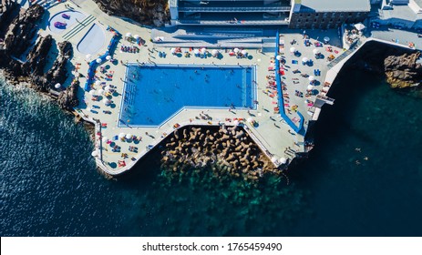 Aerial Top View Of Public Swimming Pools At Lido On Madeira Island, Portugal.