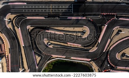 Aerial top view race kart track, Track for auto racing top view, Car race asphalt and curve street circuit, Aerial view asphalt race track.