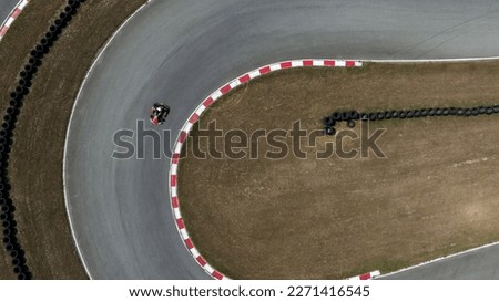 Aerial top view race kart track, Track for auto racing top view, Car race asphalt and curve grand prix street circuit, Aerial view asphalt race track.