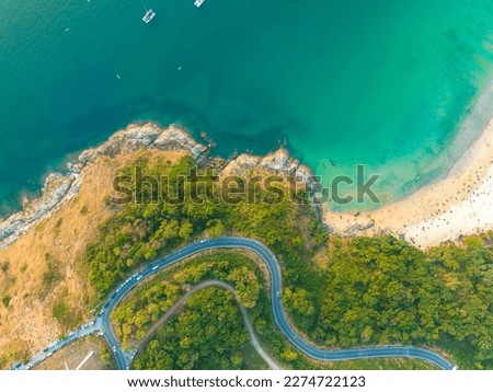 aerial top view The road around Phuket beach on the high mountain winds along the beach and various viewpoints.
The road is steep and sharp.good view on the road. relax in beautiful nature.

