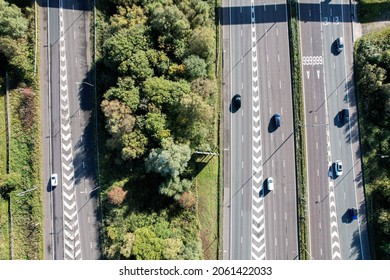 Aerial top view of road junction motorway from above, automobile traffic cars, transportation United Kingdom