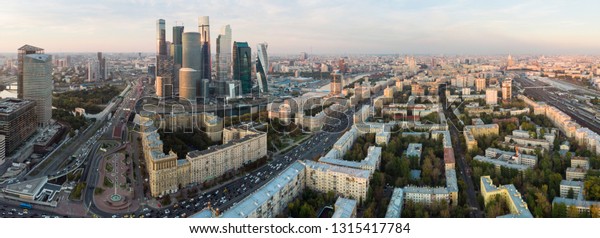 Aerial top view of road junction in\
Moscow from above, automobile traffic and jam of many cars,\
transportation concept. Kutuzov Avenue and the Third Ring\
Road