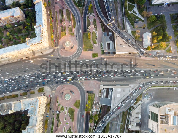 Aerial top view of road junction in
Moscow from above, automobile traffic and jam of many cars,
transportation concept. Kutuzov Avenue and the Third Ring
Road