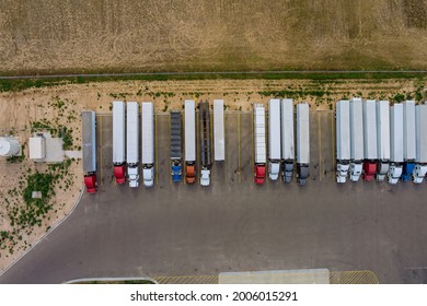 Aerial Top View Semi Truck With Cargo Trailer Car Parking Of Truck Rest Area Dock