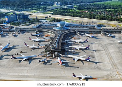 Aerial Top View Of Sheremetyevo Airport Terminal D Building With Aeroflot Airbus Boeing Passenger Airplanes Grounded Due To Covid-19 Virus Worldwide Outbreak In Moscow Russia On June 2020