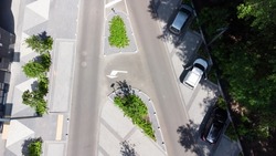 Aerial Top View Of Street With Parking Lot Near New Residential Housing Complex