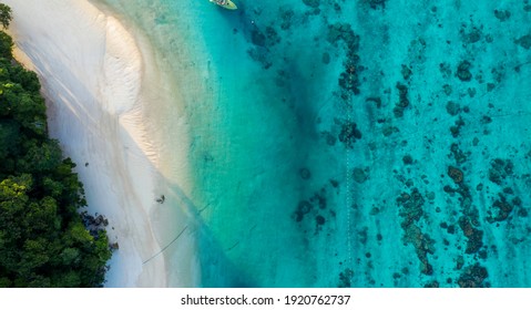 Aerial top view tropical island with white sand beach  background,summer concept