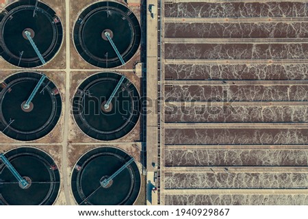 Aerial top view of water treatment plant, sedimentation basins