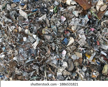 Aerial Top-Down Drone Photograph of Industrial Waste Dump (Garbage Pile) of Scrapped Iron (Iron Scrap) Ready to Be Recycled.