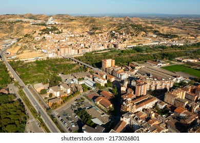 Aerial Townscape Of Fraga With View Of Cinca River. Comarca Of Bajo Cinca, Province Of Huesca, Aragon, Spain.