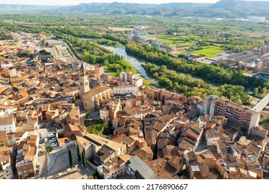 Aerial Townscape Of Fraga With View Of Cinca River. Comarca Of Bajo Cinca, Province Of Huesca, Aragon, Spain.