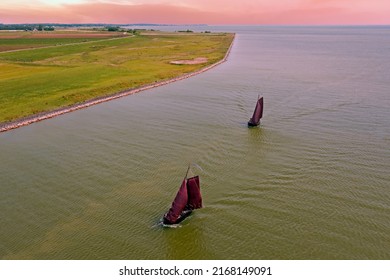 Aerial from traditional dutch wooden boats at the IJsselmeer near the harbor from Laaxum in Friesland the Netherlands 