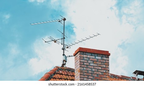Aerial TV Antenna Installed on Building Rooftop