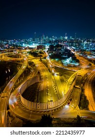 Aerial Vertical View Of Brisbane City And Highway Traffic In Australia At Night