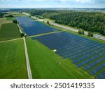 aerial vie of a huge photovoltaik power plant next to a highway in southern Germany