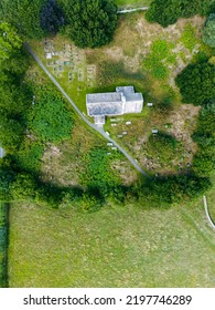 Aerial View Of 12th Century Chapel. St Mary's Church Stainburn Built English Gothic Architecture And Set Within British Countryside