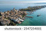 Aerial view of the 13th century Scaliegro castle on Sirmione penincula on lake Garda, Italy