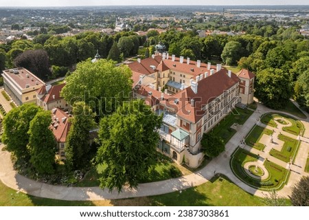 Aerial view of 16th century baroque Lancut Castle, former Polish magnate residence, Subcarpathian Voivodeship, Poland. Historic castle in beautiful green park in summer.