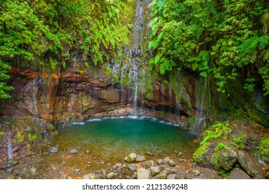 Aerial view of The 25 Fontes or 25 Springs in English. It's a group of waterfalls located in Rabacal, Paul da Serra on Madeira Island. Access is possible via the Levada das 25 Fontes - Shutterstock ID 2121369248