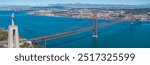 Aerial view of the 25th April Bridge - Ponte 25 de Abril - is a suspension bridge road-rail over the Tagus river that connects the city of Lisbon to the city of Almada. Panoramic view from above.