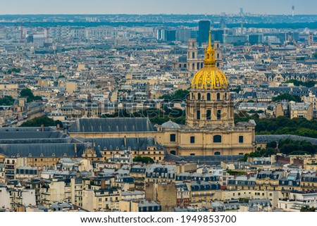 Aerial view of the 7th arrondissement of Paris with the gilded dome of the Saint-Louis-des-Invalides Cathedral.