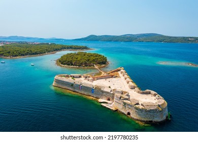 Aerial view about St. Nicholas Fortress (Croatian: Tvrđava sv. Nikole) which located at the entrance to St. Anthony Channel, near the town of Šibenik in central Dalmatia, Croatia.